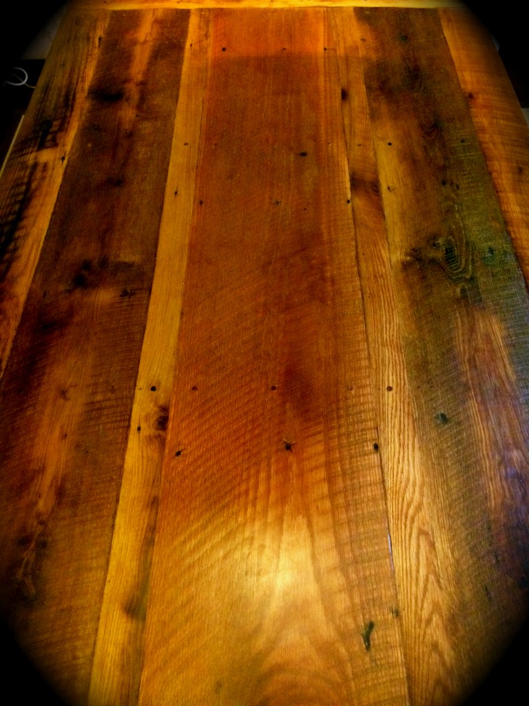 Hand crafted from 70+ yr. old reclaimed oak barn wood. Here is the top. It is 4 ft. by 7 ft. and will seat 10 comfortably.